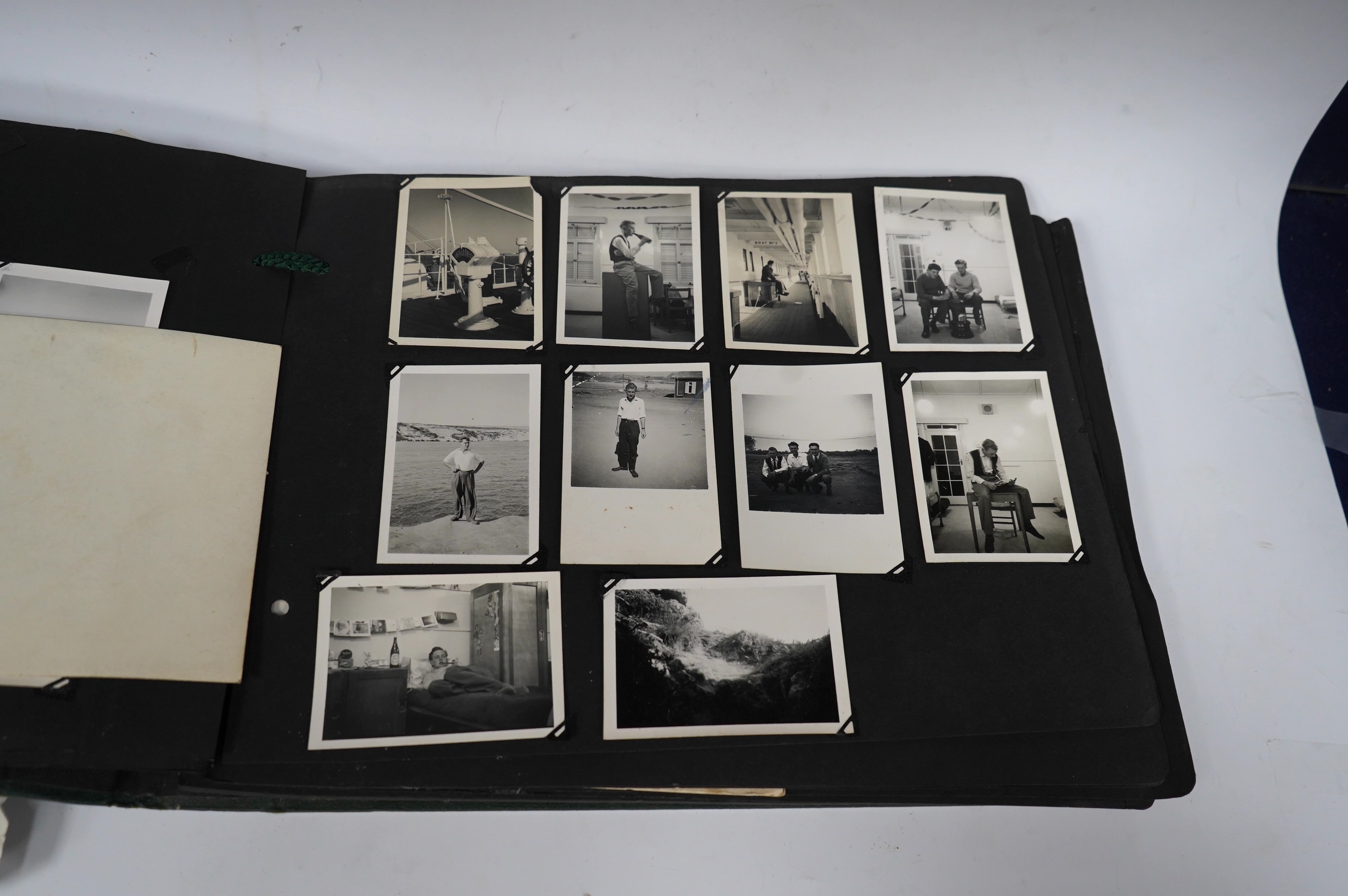 Two 1940s family photograph albums, including a few 1930s postcards, two photos of RAF aircraft, as well as military photographs of soldiers in uniform, etc. Condition - poor to fair